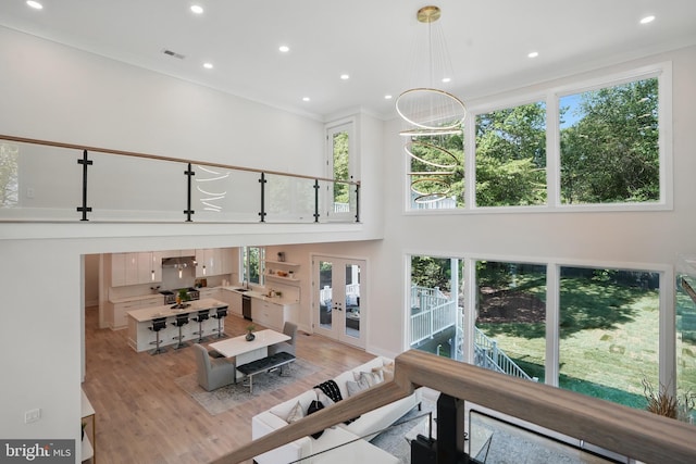 4134 Maple Ave, Fairfax, VA 22032 - living room with visible vents, ornamental molding, a high ceiling, recessed lighting, and light wood finished floors
