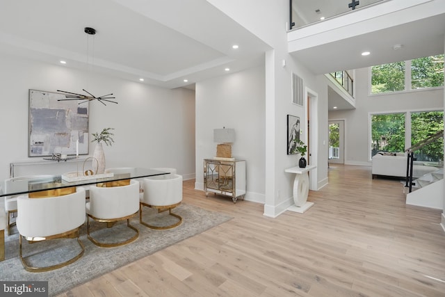 4134 Maple Ave, Fairfax, VA 22032 - dining space featuring visible vents, a high ceiling, wood finished floors, and recessed lighting