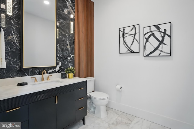 4134 Maple Ave, Fairfax, VA 22032 - bathroom featuring vanity, marble finish floor, baseboards, and toilet