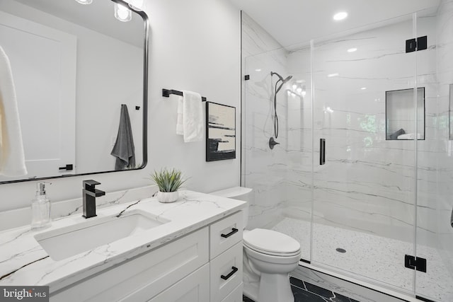 4134 Maple Ave, Fairfax, VA 22032 - full bathroom with vanity, toilet, marble finish floor, a marble finish shower, and recessed lighting
