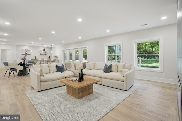 4134 Maple Ave, Fairfax, VA 22032 - living room featuring french doors, light wood-style flooring, recessed lighting, baseboards, and visible vents