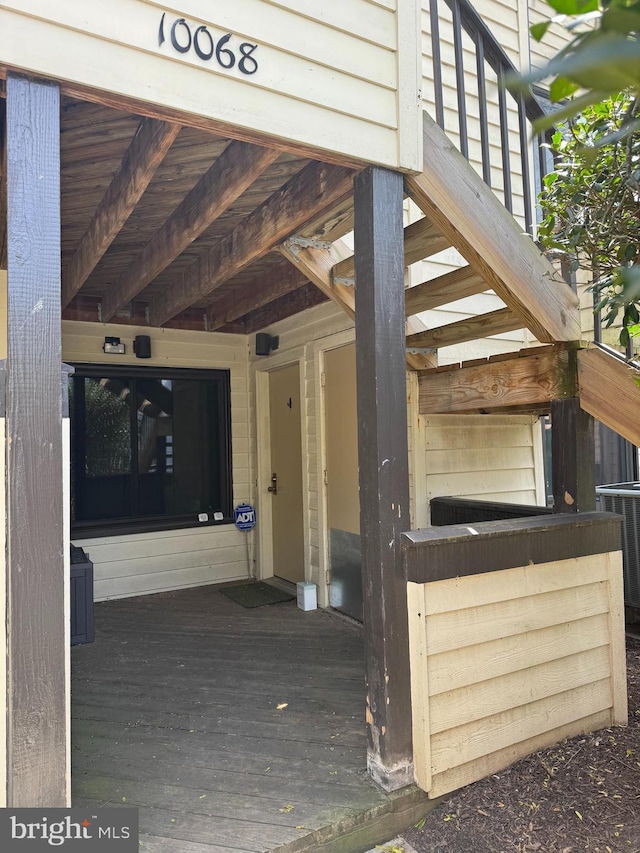 doorway to property with cooling unit