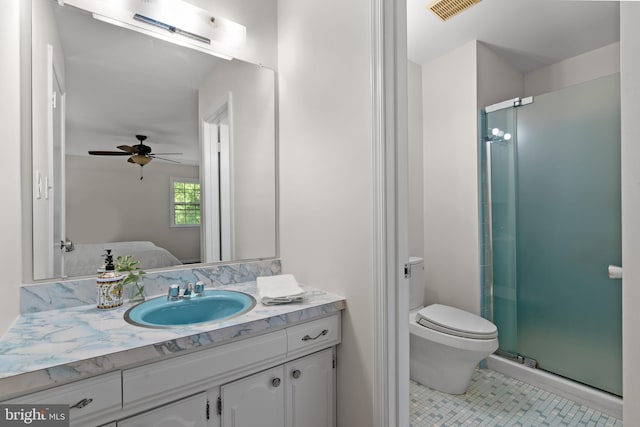 ensuite bathroom with toilet, tile patterned floors, ensuite bathroom, visible vents, and a stall shower