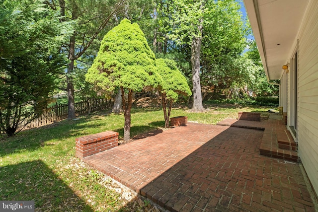 view of patio with fence