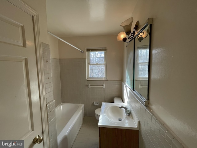 100 Park Blvd Unit 17D, Cherry Hill, NJ 08034 - full bathroom with vanity, shower / washtub combination, toilet, tile walls, and a wainscoted wall