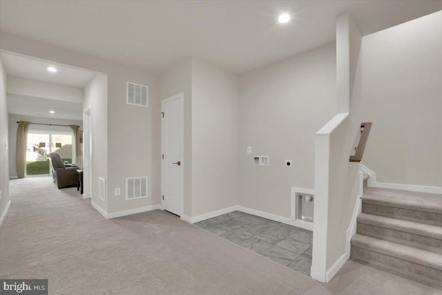 washroom with washer hookup, laundry area, electric dryer hookup, and visible vents