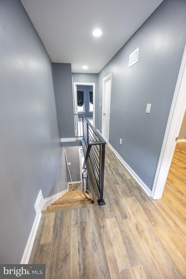 173 W Seymour St, Philadelphia, PA 19144 - stairway featuring wood finished floors, baseboards, and visible vents