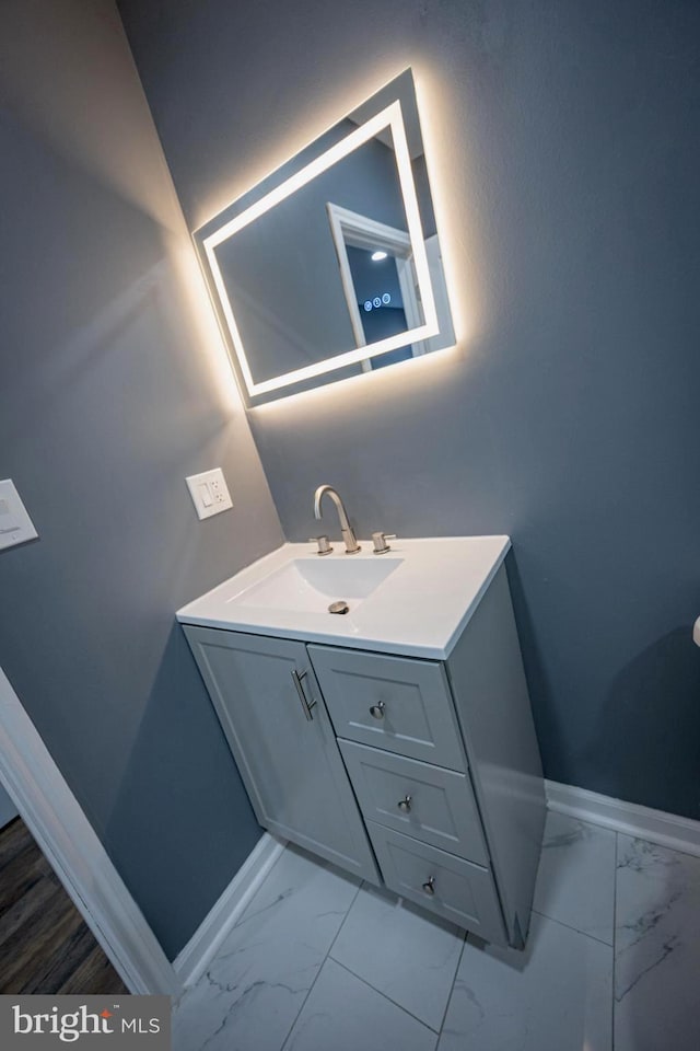 173 W Seymour St, Philadelphia, PA 19144 - bathroom with marble finish floor, baseboards, and vanity
