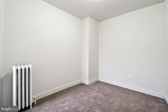 4914 N Smedley St, Philadelphia, PA 19141 - empty room with baseboards, radiator, and carpet