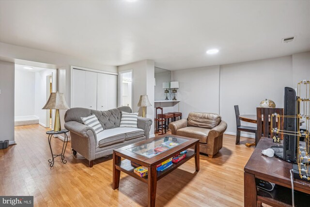 3 Casino Ct, Silver Spring, MD 20906 - living area featuring visible vents, light wood-type flooring, and baseboards