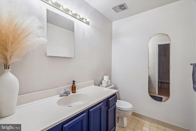 3 Casino Ct, Silver Spring, MD 20906 - bathroom featuring toilet, vanity, baseboards, and visible vents