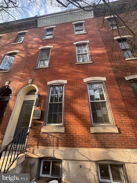 1809 Christian St, Philadelphia, PA 19146 - view of home's exterior featuring brick siding