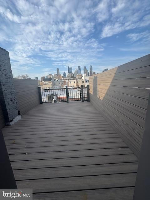 1809 Christian St, Philadelphia, PA 19146 - wooden terrace featuring a view of city