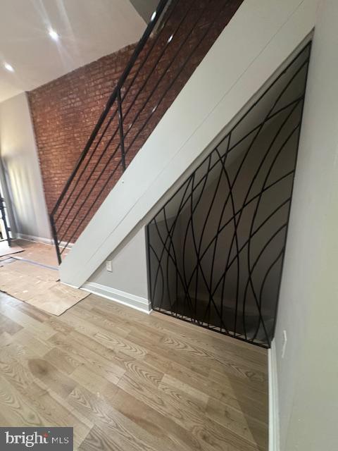 1809 Christian St, Philadelphia, PA 19146 - stairs with baseboards and wood finished floors
