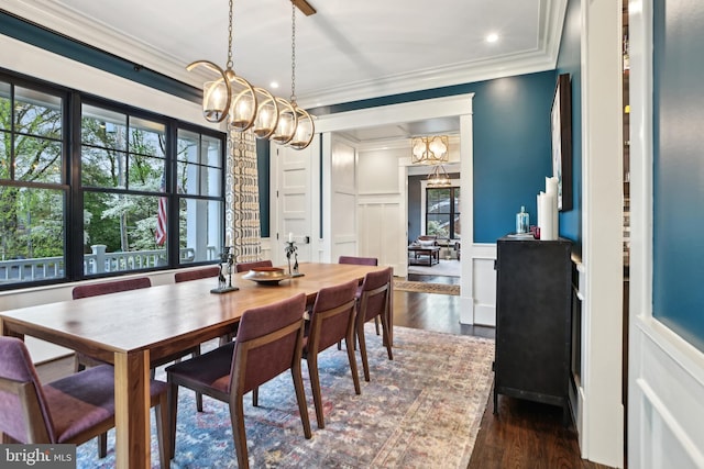 4777 33rd St N, Arlington, VA 22207 - dining room featuring a healthy amount of sunlight, a chandelier, ornamental molding, and a decorative wall