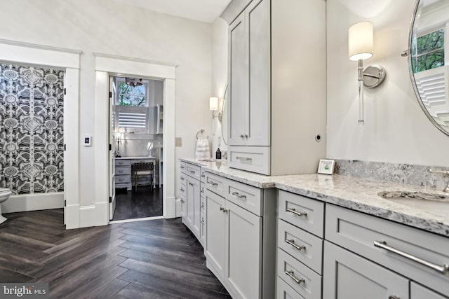 4777 33rd St N, Arlington, VA 22207 - bathroom with vanity, wood finished floors, and plenty of natural light