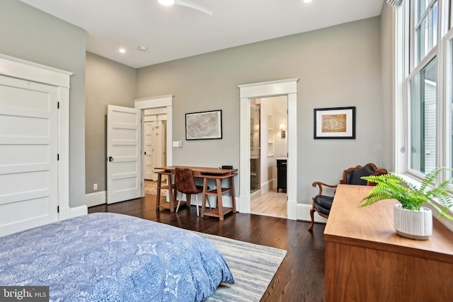 4777 33rd St N, Arlington, VA 22207 - bedroom with connected bathroom, baseboards, dark wood-style flooring, and recessed lighting