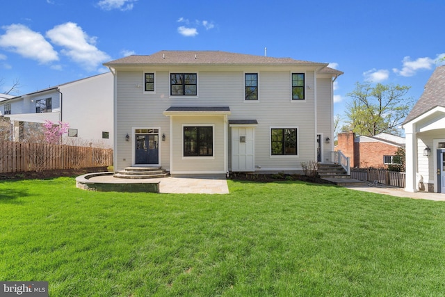 4777 33rd St N, Arlington, VA 22207 - rear view of property featuring a patio area, a lawn, and fence
