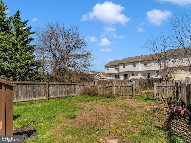 view of yard with fence
