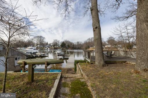 dock area featuring a water view