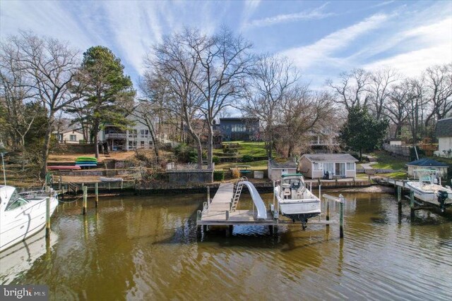dock area featuring a water view and boat lift