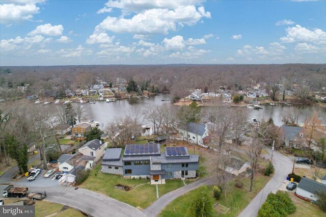 aerial view featuring a water view and a residential view