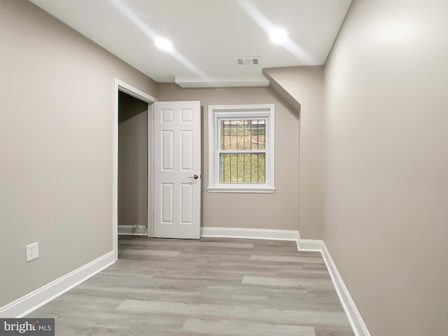 bonus room featuring recessed lighting, light wood finished floors, visible vents, and baseboards