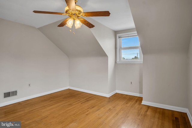 413 W Marble St, Mechanicsburg, PA 17055 - additional living space with baseboards, wood-type flooring, a ceiling fan, and lofted ceiling
