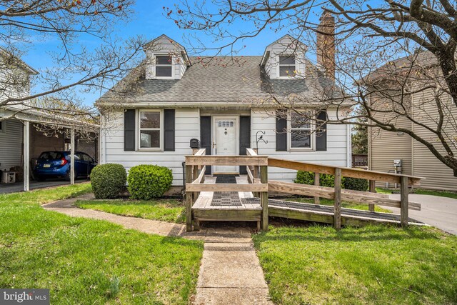 413 W Marble St, Mechanicsburg, PA 17055 - view of front facade with a front yard, a chimney, and roof with shingles
