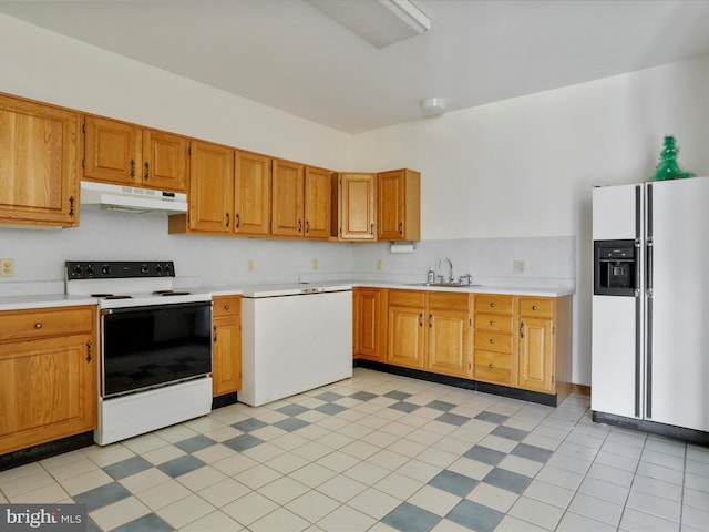 kitchen featuring a sink, light countertops, white appliances, under cabinet range hood, and brown cabinets