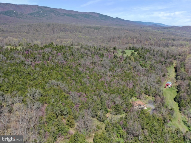 aerial view with a forest view and a mountain view