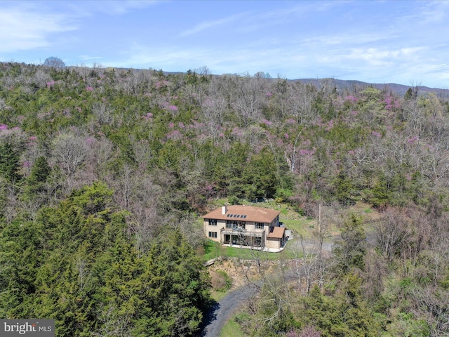 drone / aerial view with a forest view