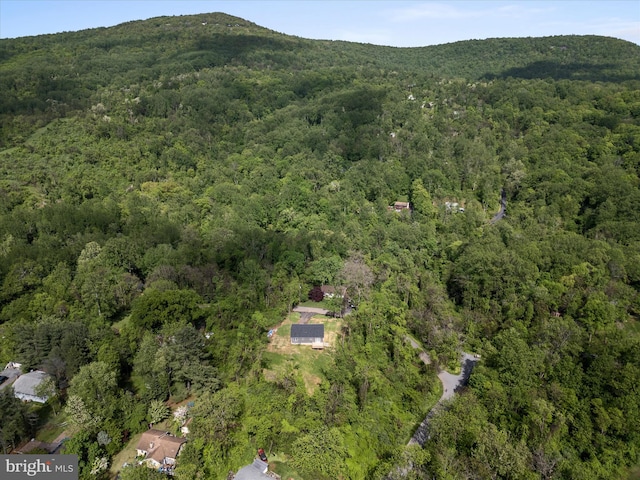47 Snowbird Ct, Front Royal, VA 22630 - aerial view of property's location featuring a heavily wooded area and a mountain backdrop