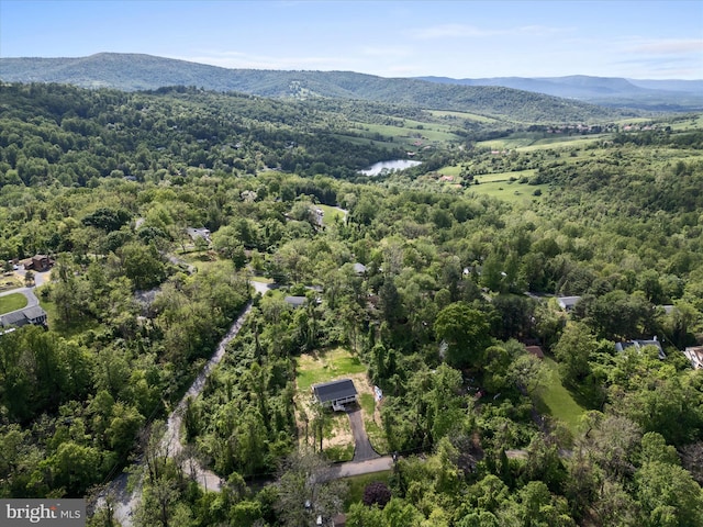 47 Snowbird Ct, Front Royal, VA 22630 - aerial view of property and surrounding area with a heavily wooded area and a mountain backdrop