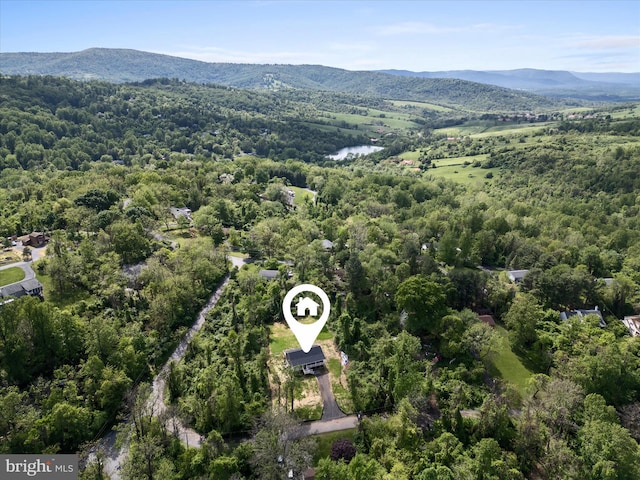 47 Snowbird Ct, Front Royal, VA 22630 - aerial view of property and surrounding area featuring a heavily wooded area and a mountainous background