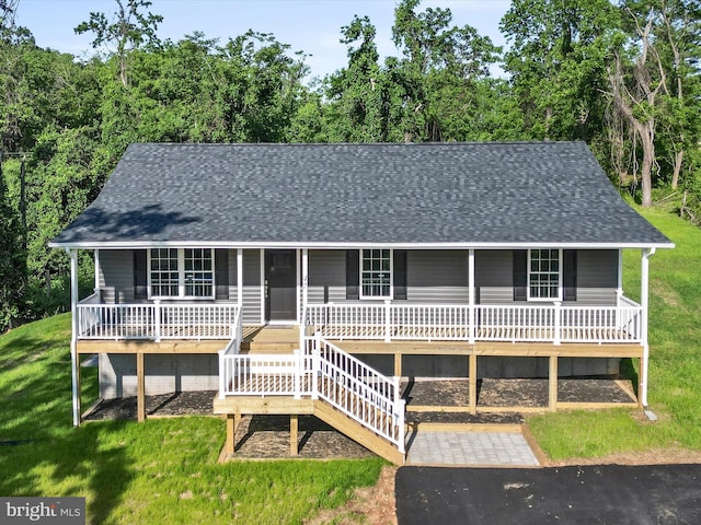 47 Snowbird Ct, Front Royal, VA 22630 - view of front of house with covered porch, a shingled roof, and a front lawn