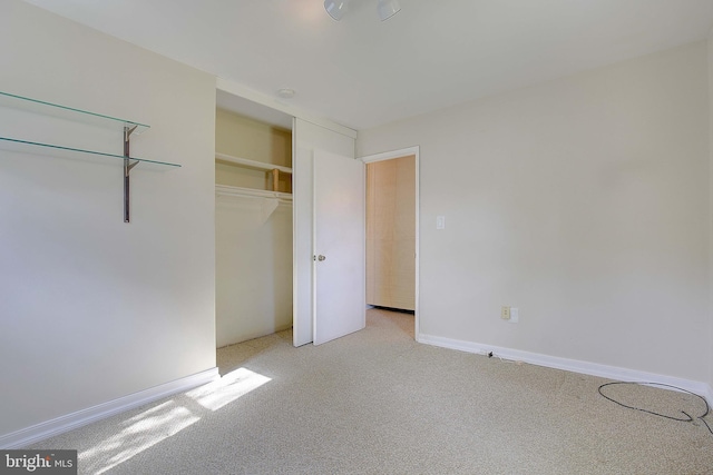 7203 Roanne Dr, Oxon Hill, MD 20745 - unfurnished bedroom featuring light carpet and baseboards