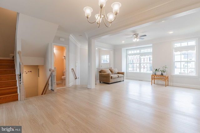 15332 Ballerina Loop, Woodbridge, VA 22193 - living area with ornamental molding, light wood finished floors, an upstairs landing, a chandelier, and baseboards