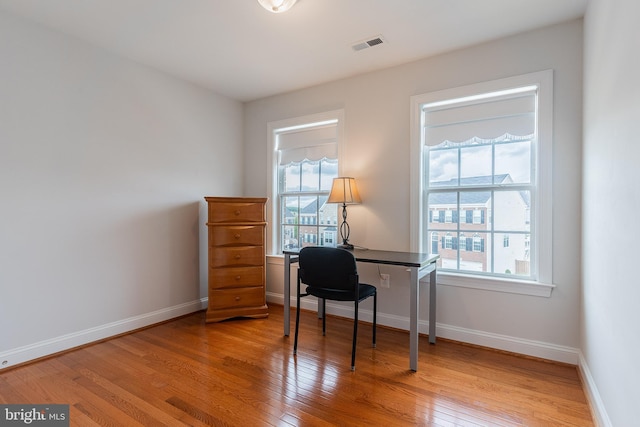 15332 Ballerina Loop, Woodbridge, VA 22193 - office area with light wood finished floors, plenty of natural light, and baseboards