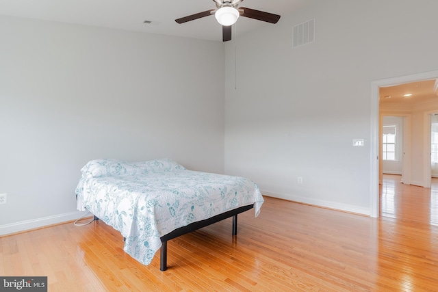 15332 Ballerina Loop, Woodbridge, VA 22193 - bedroom with light wood-style flooring, baseboards, and a ceiling fan