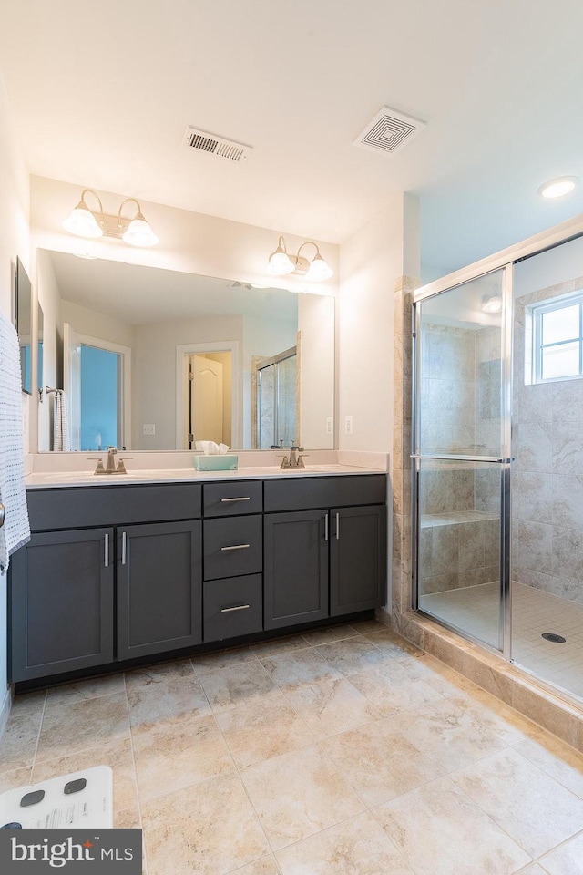 15332 Ballerina Loop, Woodbridge, VA 22193 - bathroom with a shower stall and double vanity