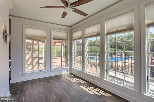 121 Rich Valley Rd, Mechanicsburg, PA 17050 - unfurnished sunroom with crown molding, baseboards, and wood finished floors
