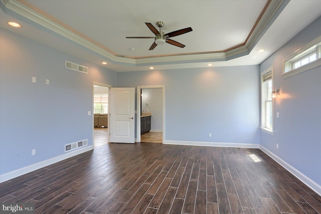 121 Rich Valley Rd, Mechanicsburg, PA 17050 - unfurnished room featuring a ceiling fan, dark wood-style flooring, visible vents, a raised ceiling, and ornamental molding