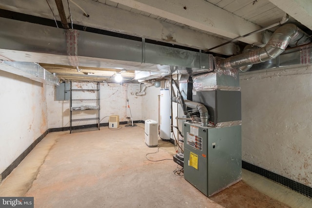 unfinished below grade area with water heater, heating unit, baseboards, and electric panel