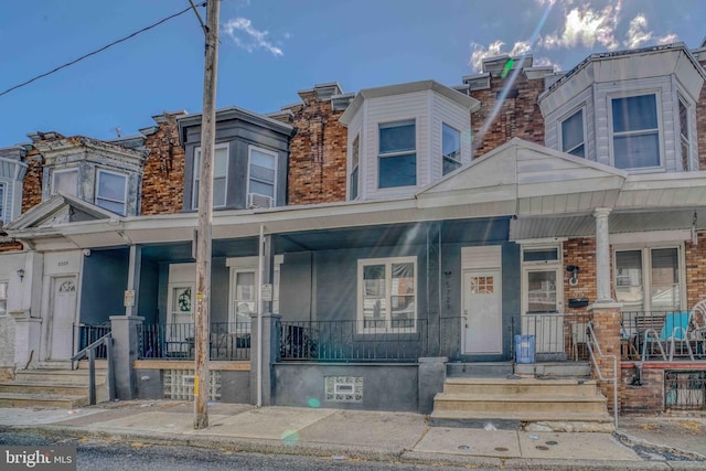 multi unit property featuring covered porch