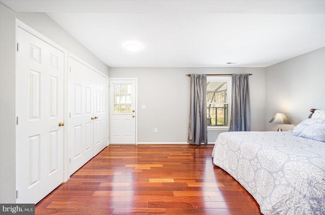 16012 Howard Landing Dr, Gaithersburg, MD 20878 - bedroom featuring baseboards and wood finished floors