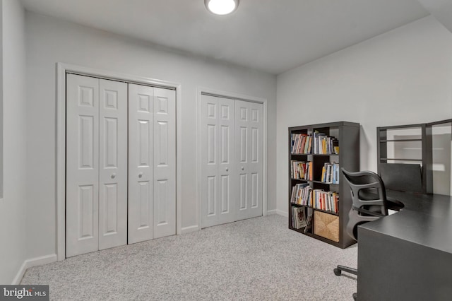 office featuring baseboards and carpet