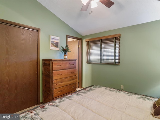 bedroom with ceiling fan and vaulted ceiling