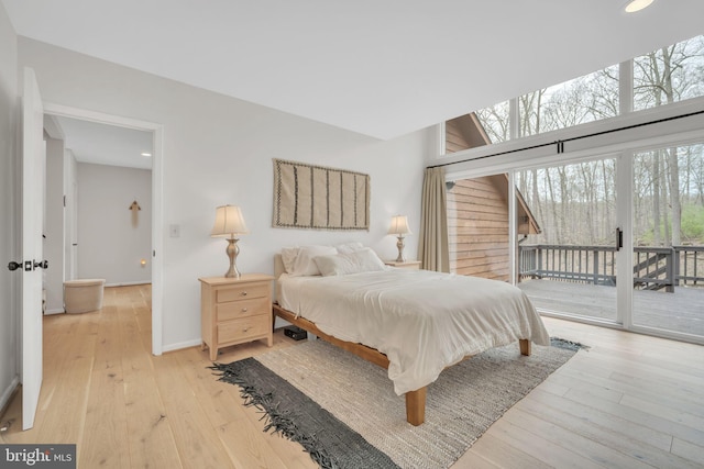38528 Lime Kiln Rd, Middleburg, VA 20117 - bedroom with light wood-style flooring, access to exterior, and baseboards