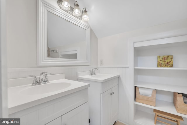 38528 Lime Kiln Rd, Middleburg, VA 20117 - full bathroom featuring two vanities, a sink, and a wainscoted wall